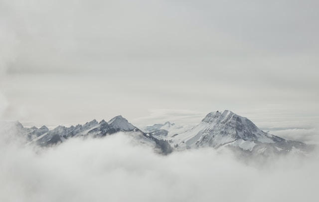 Landscape photograph of gray snowy mountains