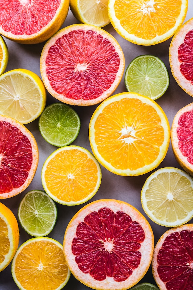 Slices of fruit including oranges and limes